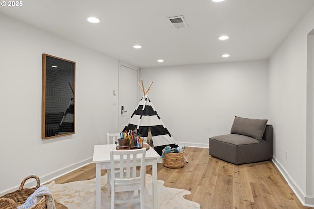 4000 NE Hassalo St, Portland, OR 97232 - recreation room with light wood finished floors, recessed lighting, and baseboards
