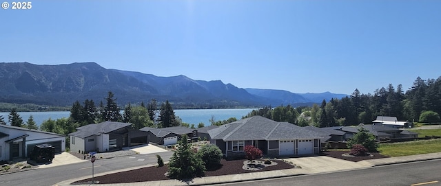 243 NE Hemmingway Dr, Stevenson, WA 98648 - view of mountain background with a nearby body of water and nearby suburban area