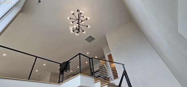 243 NE Hemmingway Dr, Stevenson, WA 98648 - stairs with a chandelier