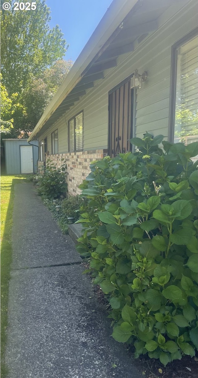11181120 SE 45th Ave, Portland, OR 97215 - view of home's exterior featuring brick siding