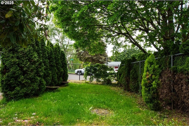 view of yard with fence