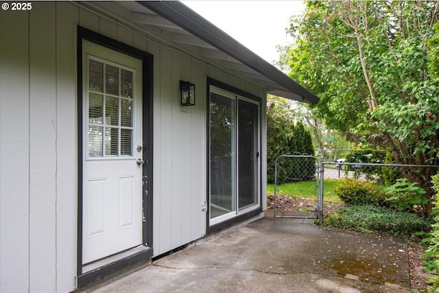 doorway to property with fence