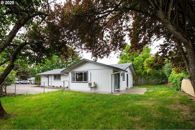 back of house featuring a cooling unit
