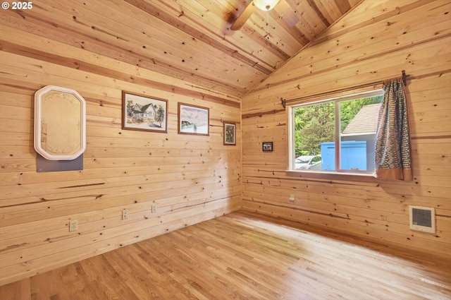 10268 Field Crest Dr, Birkenfeld, OR 97016 - empty room with vaulted ceiling, wooden ceiling, ceiling fan, wood walls, and wood finished floors