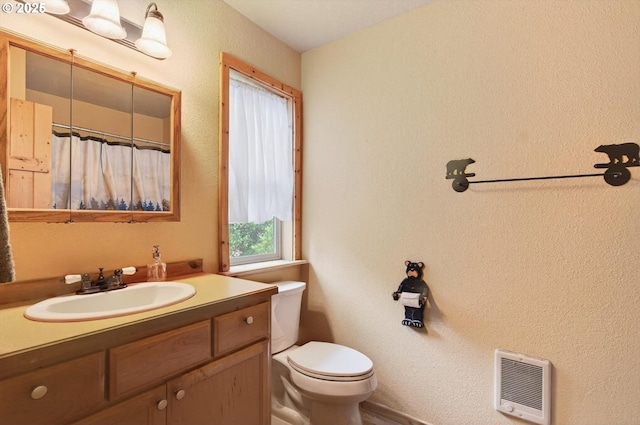 10268 Field Crest Dr, Birkenfeld, OR 97016 - full bathroom featuring heating unit, vanity, and a shower with shower curtain
