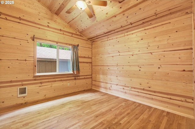 10268 Field Crest Dr, Birkenfeld, OR 97016 - empty room with wood ceiling, vaulted ceiling, wooden walls, ceiling fan, and light wood-style flooring