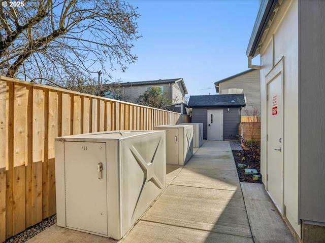 view of patio / terrace with a storage unit