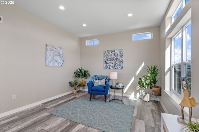 313 Art Kegler Blvd, Boardman, OR 97818 - sitting room featuring baseboards, wood finished floors, and recessed lighting