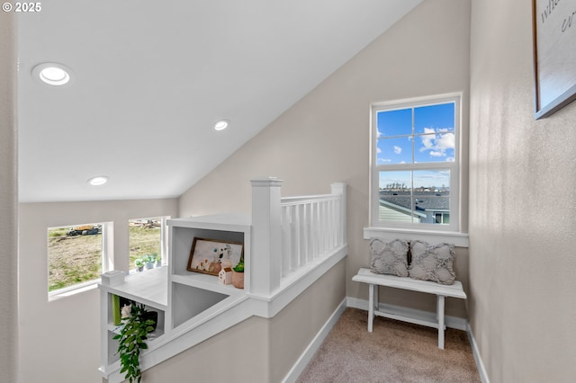 313 Art Kegler Blvd, Boardman, OR 97818 - hallway with lofted ceiling, carpet flooring, plenty of natural light, baseboards, and recessed lighting