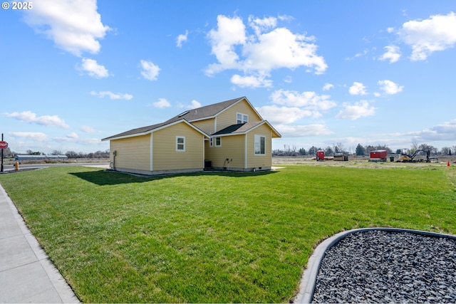 313 Art Kegler Blvd, Boardman, OR 97818 - view of home's exterior featuring a lawn