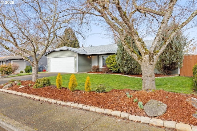 single story home featuring a garage and a front lawn