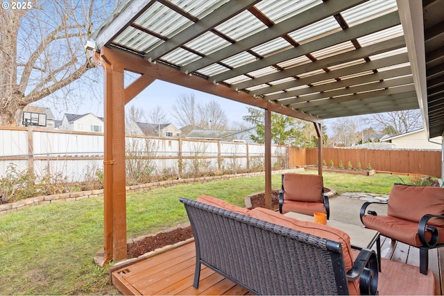 wooden deck with a patio, outdoor lounge area, a pergola, and a lawn