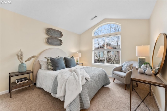 carpeted bedroom featuring vaulted ceiling