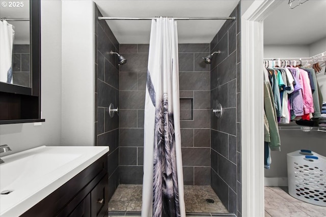 14510 NE 50th St, Vancouver, WA 98682 - full bathroom featuring vanity, a stall shower, and a walk in closet