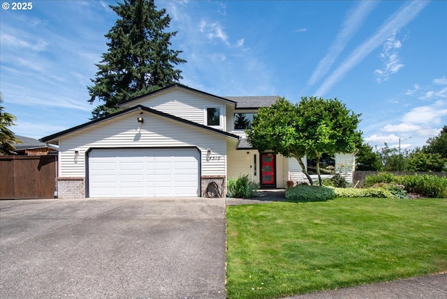 14510 NE 50th St, Vancouver, WA 98682 - view of front facade with brick siding, a garage, and asphalt driveway