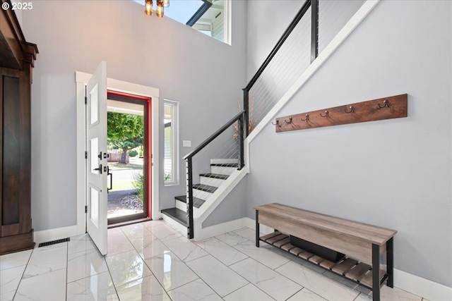 14510 NE 50th St, Vancouver, WA 98682 - foyer featuring marble finish floors, stairs, a towering ceiling, and a chandelier