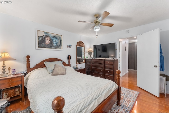2710 SE 138th Ave Unit 48, Portland, OR 97236 - bedroom featuring light wood-style floors and a ceiling fan