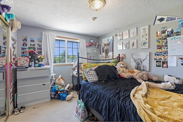 410 W Jefferson St, Carlton, OR 97111 - carpeted bedroom featuring a textured ceiling
