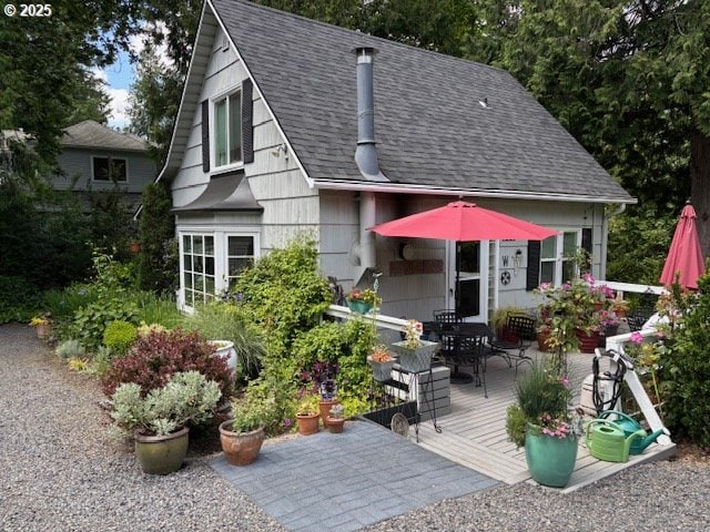 5665 Bonita Rd, Lake Oswego, OR 97035 - rear view of house with a deck, a shingled roof, and outdoor dining space