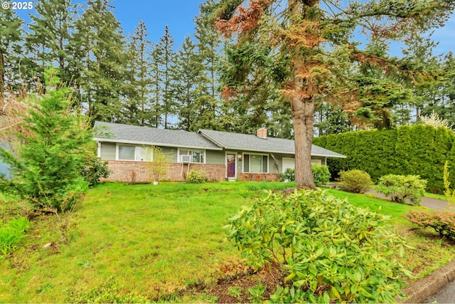 600 NE 144th Ave, Vancouver, WA 98684 - ranch-style home with brick siding, a chimney, and a front yard