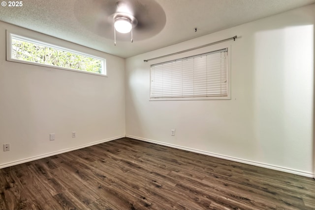600 NE 144th Ave, Vancouver, WA 98684 - unfurnished room featuring dark wood-style floors, baseboards, and ceiling fan