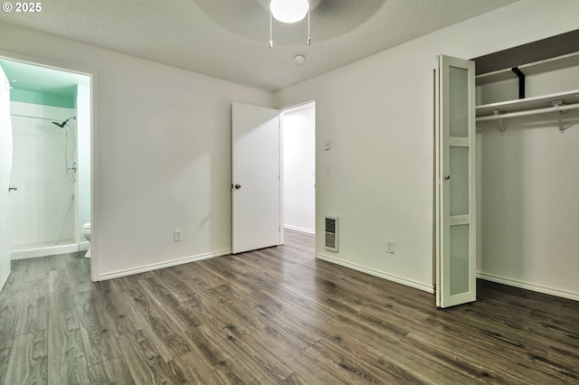 600 NE 144th Ave, Vancouver, WA 98684 - unfurnished bedroom with wood finished floors, a closet, ensuite bath, baseboards, and ceiling fan
