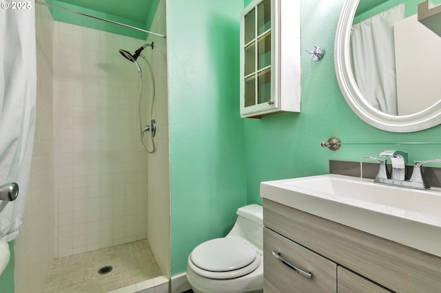 600 NE 144th Ave, Vancouver, WA 98684 - bathroom with toilet, a tile shower, and vanity