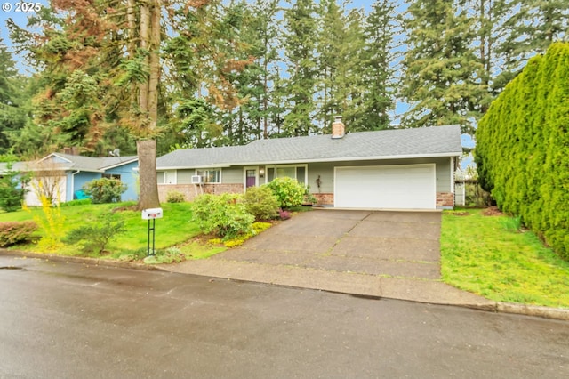 600 NE 144th Ave, Vancouver, WA 98684 - ranch-style house featuring an attached garage, driveway, a front yard, a chimney, and brick siding