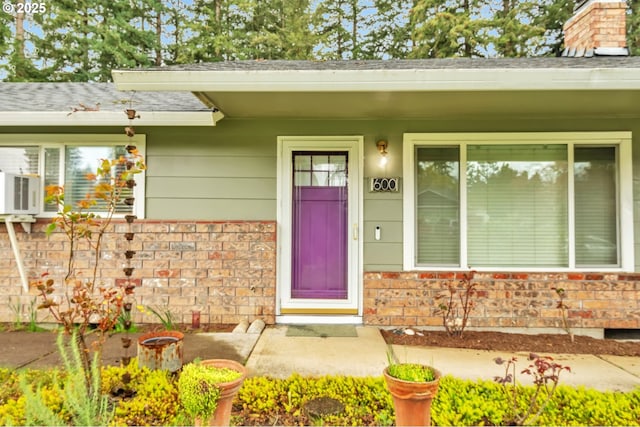 600 NE 144th Ave, Vancouver, WA 98684 - entrance to property featuring brick siding, roof with shingles, and a porch