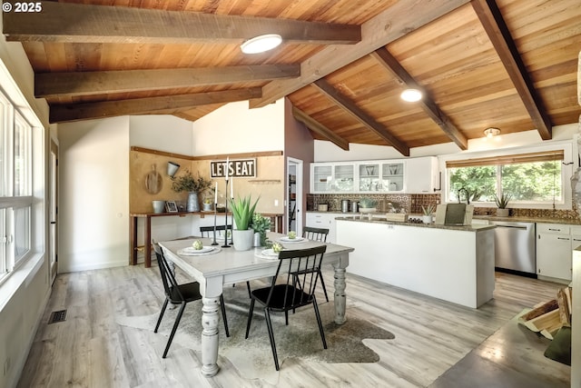 dining space featuring wood ceiling and light wood-type flooring