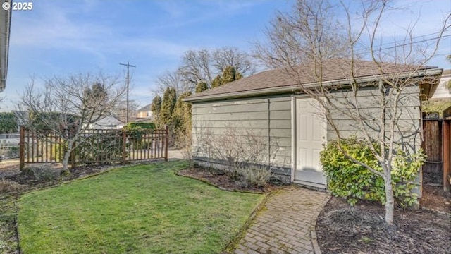 view of outdoor structure with a yard