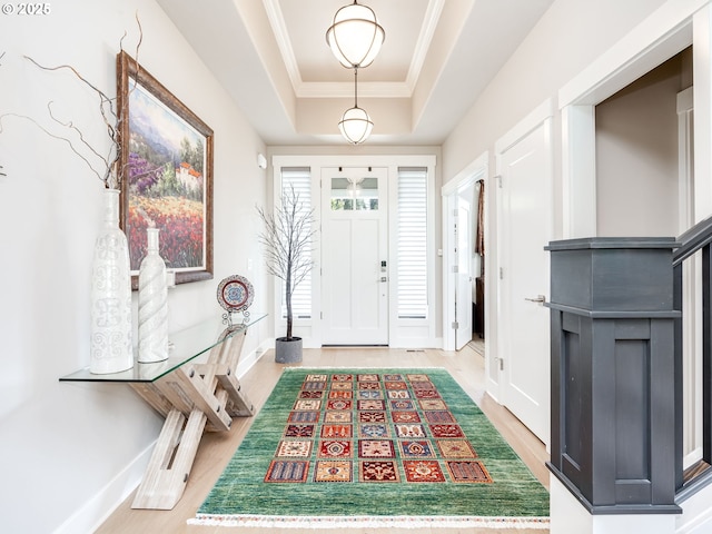 1856 NW Sierra Way, Camas, WA 98607 - foyer featuring a tray ceiling, light wood-style flooring, and ornamental molding