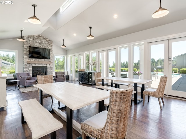1856 NW Sierra Way, Camas, WA 98607 - dining space with vaulted ceiling, healthy amount of natural light, french doors, a fireplace, and dark wood finished floors