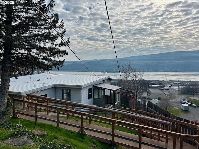 exterior space featuring a mountain view