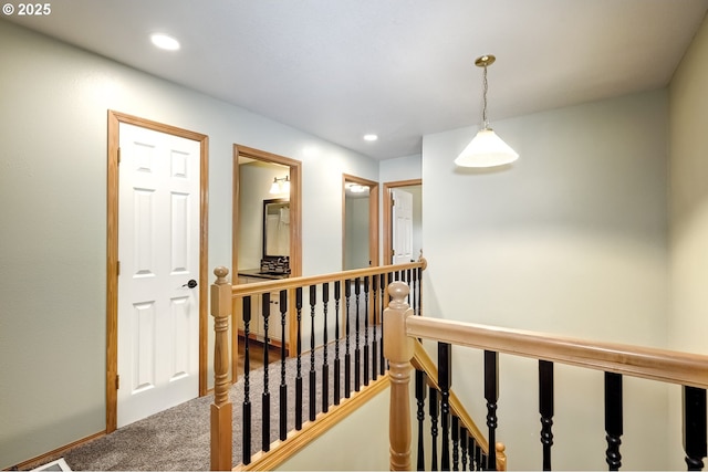 corridor featuring carpet flooring