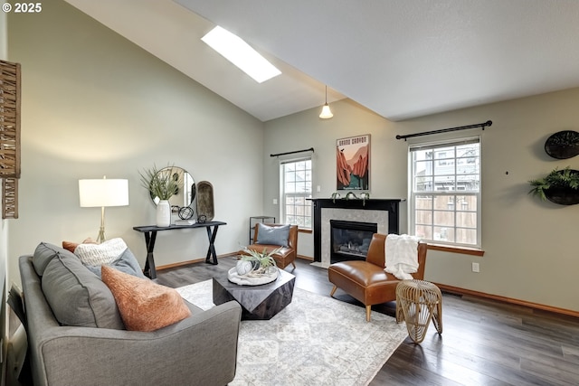 living room with high vaulted ceiling, dark wood-type flooring, and a fireplace