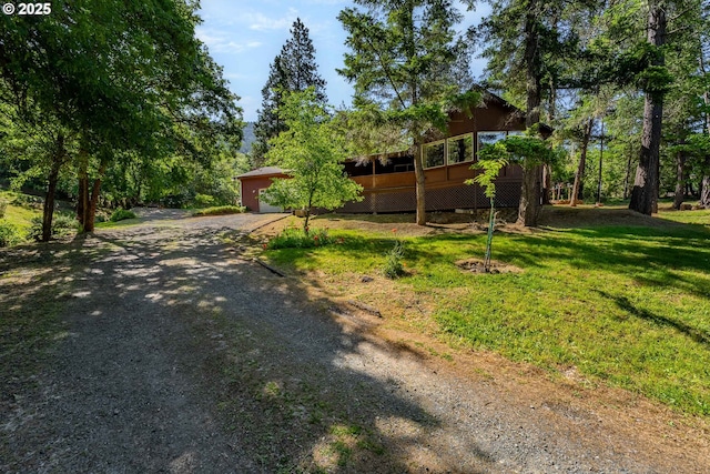 905 Summit Loop, Grants Pass, OR 97527 - view of front of house featuring driveway and a front yard