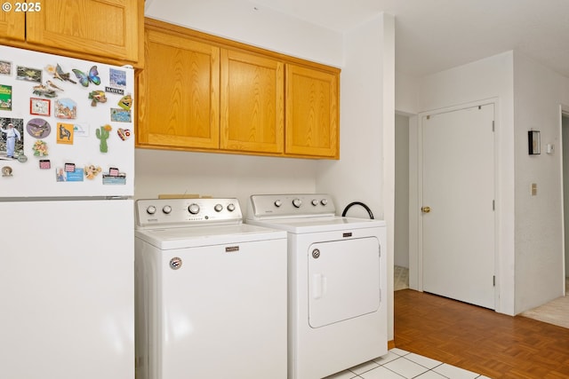 905 Summit Loop, Grants Pass, OR 97527 - laundry room featuring cabinet space and separate washer and dryer