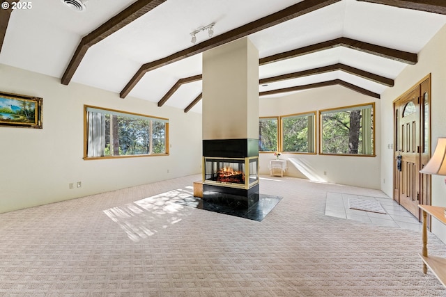 905 Summit Loop, Grants Pass, OR 97527 - unfurnished living room featuring healthy amount of natural light and carpet floors