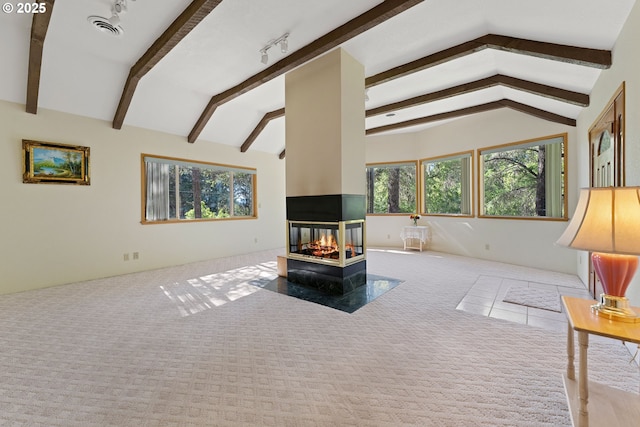 905 Summit Loop, Grants Pass, OR 97527 - carpeted living area with a wood stove and track lighting