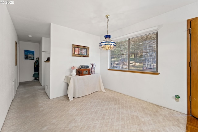 905 Summit Loop, Grants Pass, OR 97527 - corridor with a chandelier and carpet flooring