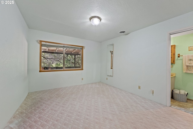 905 Summit Loop, Grants Pass, OR 97527 - carpeted empty room with a textured ceiling