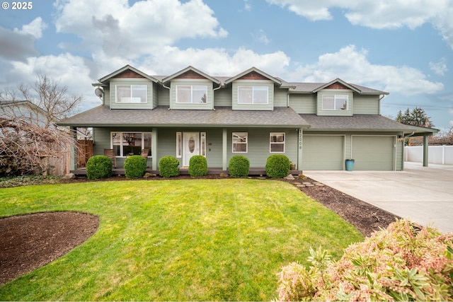 view of front facade with concrete driveway, an attached garage, fence, a porch, and a front yard