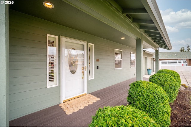 entrance to property featuring a porch