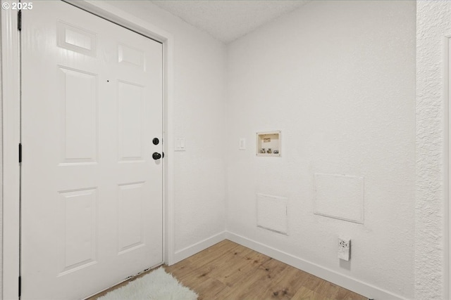 662 Cannavina Rd, Carson, WA 98610 - laundry area with light wood finished floors and hookup for a washing machine