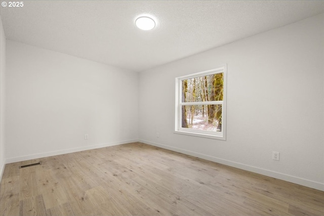 662 Cannavina Rd, Carson, WA 98610 - empty room with wood finished floors and baseboards
