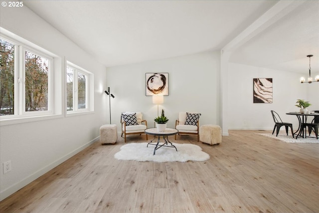 662 Cannavina Rd, Carson, WA 98610 - living area with wood finished floors and a chandelier