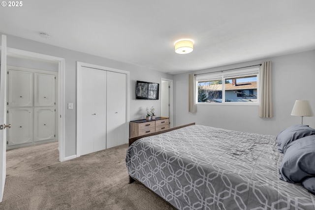 bedroom with carpet floors and a closet