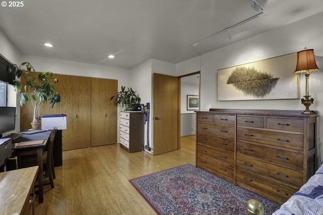 bedroom featuring recessed lighting and light wood-style flooring