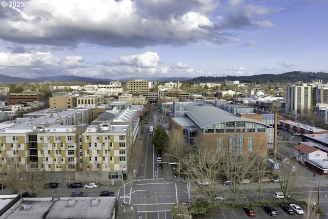 bird's eye view with a view of city and a mountain view